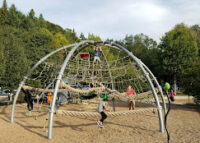 Golden Gardens Playground climbing dowm.