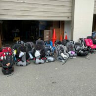 An “Incoming” bag of donated car seats awaits inspection at WestSide Baby, where gently used seats are processed and matched with local families who need them.