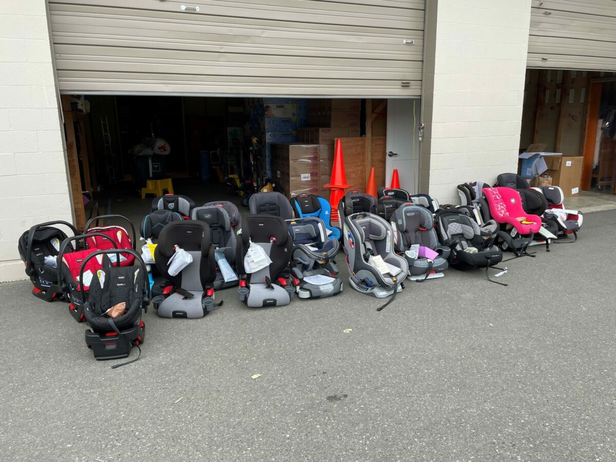 An “Incoming” bag of donated car seats awaits inspection at WestSide Baby, where gently used seats are processed and matched with local families who need them.