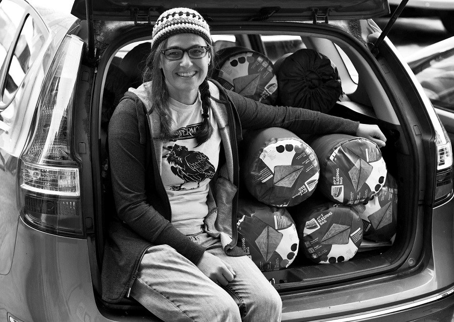 Help people: Suzanne Stauss with car load of sleeping bags