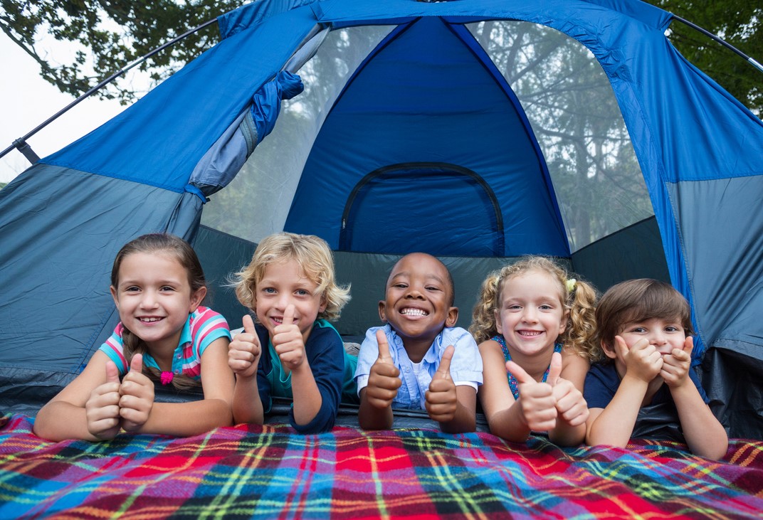 campgrounds: happy kids in a tent