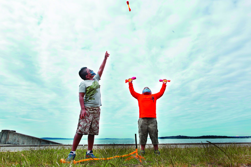 Brothers with stomp rocket