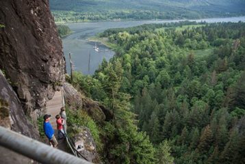 hiking up steep path, river in backgroiund