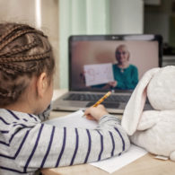 remote learning: girl at laptop