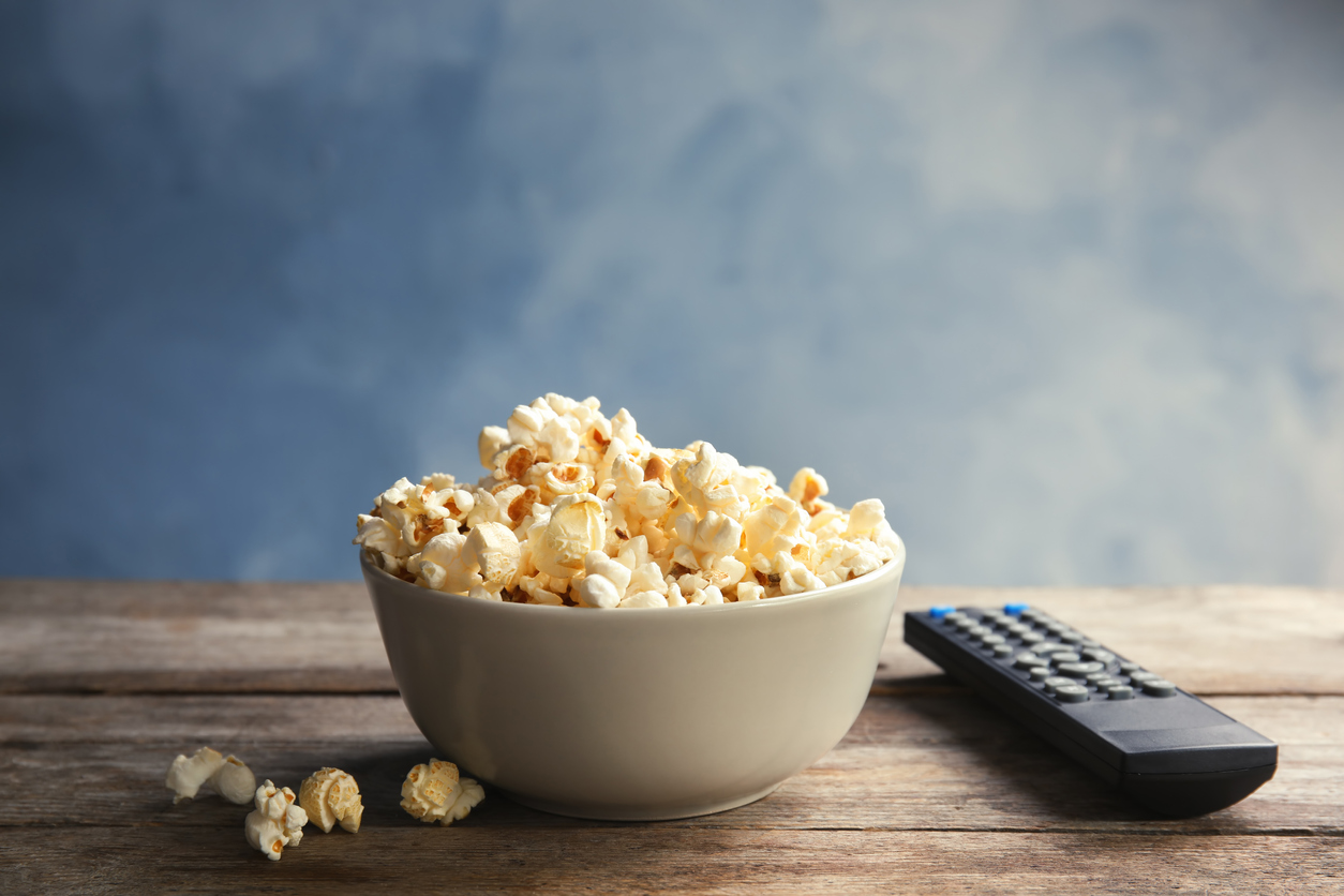 take a break: Bowl of popcorn and TV remote