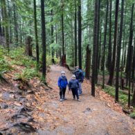 Father and sons on the trail in Olallie State Park