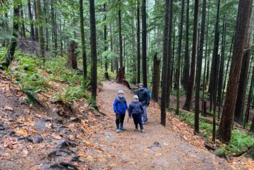 Father and sons on the trail in Olallie State Park