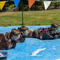 Child participates in the human slug race during Slug Fest at Northwest Trek Wildlife Park