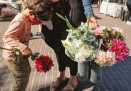 Picking up flowers at the Farmers Market