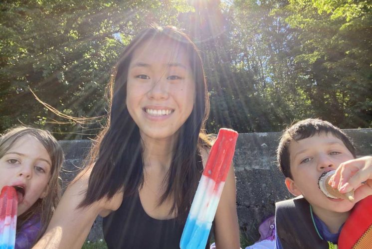 Seattle nanny enjoying frozen treats with two young children