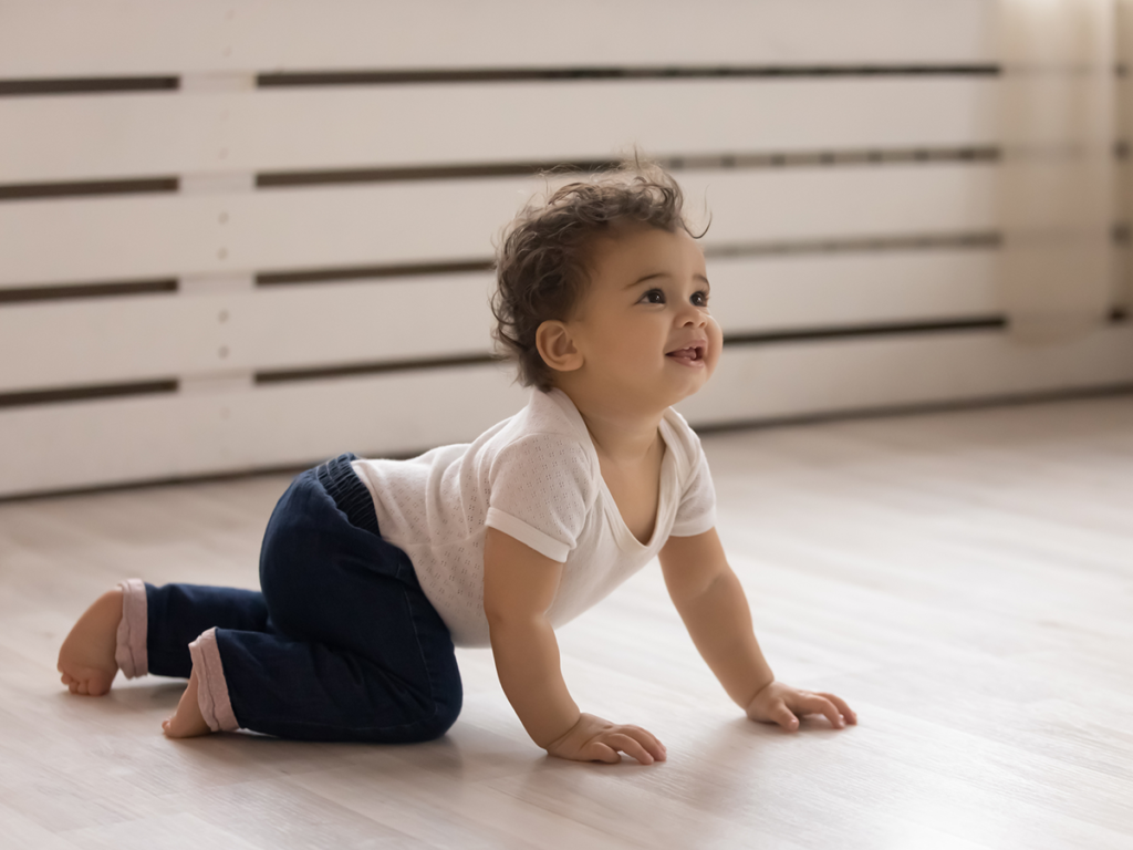 Wonderland Child & Family Services - baby crawling