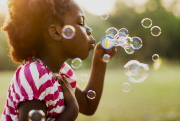 End of summer activities include blowing bubbles
