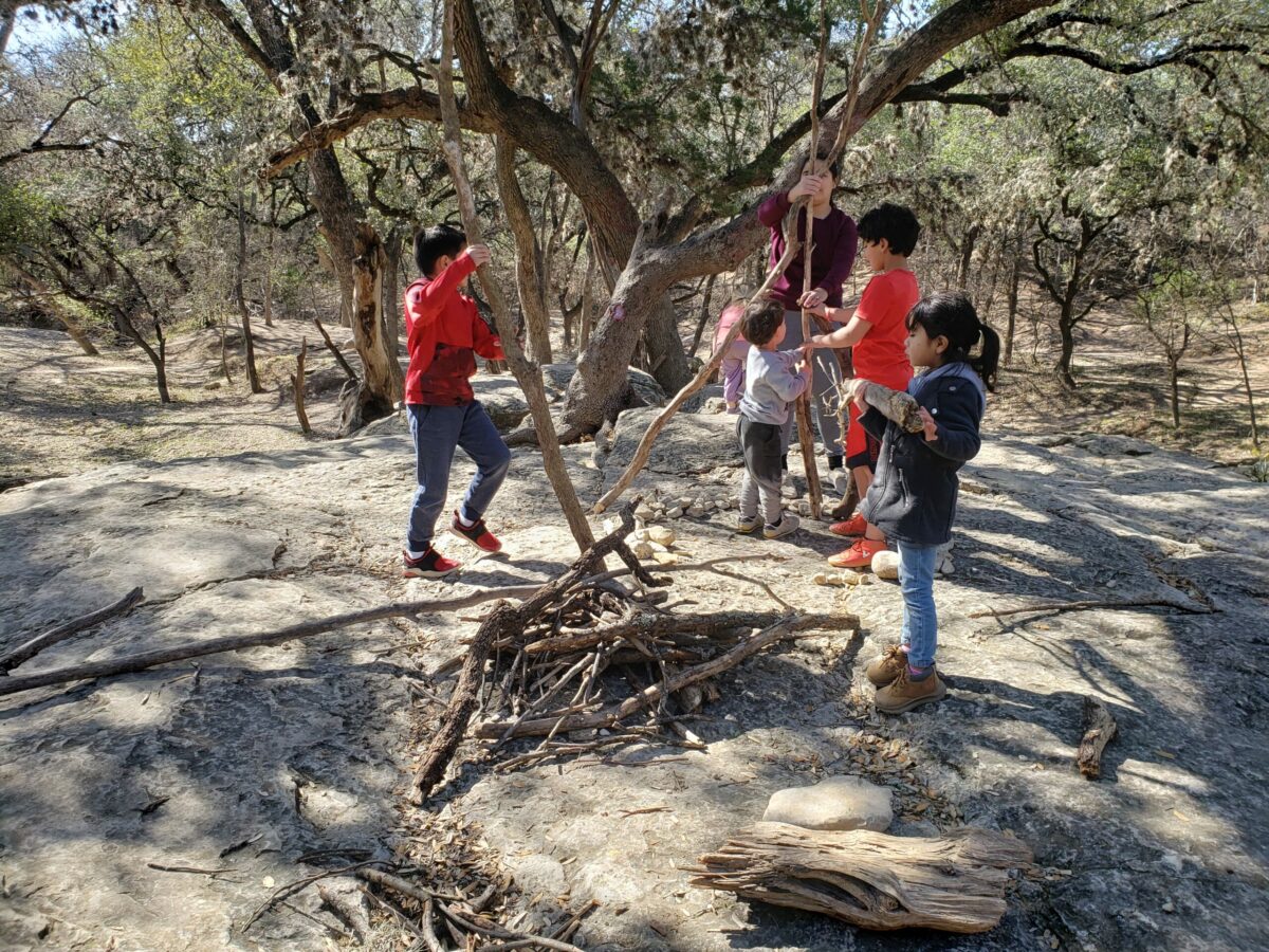 outdoor play groups: Kids use natural materials for imaginative play
