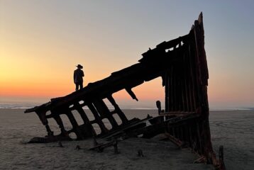 Travel to Astoria, Oregon and see shipwrecks on the beach.