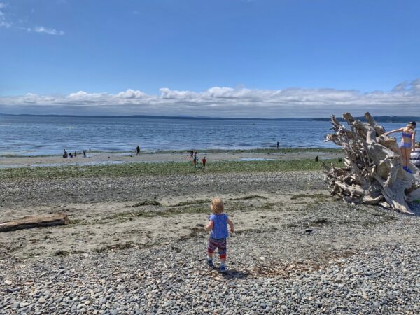 Child walking on Richmond Beach.