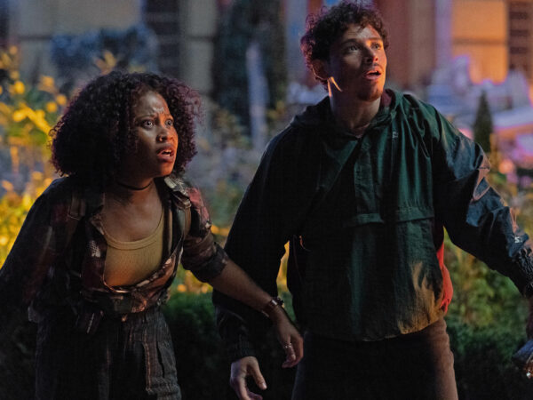 Two characters in the Transformers movie that work with the robots to save the world.