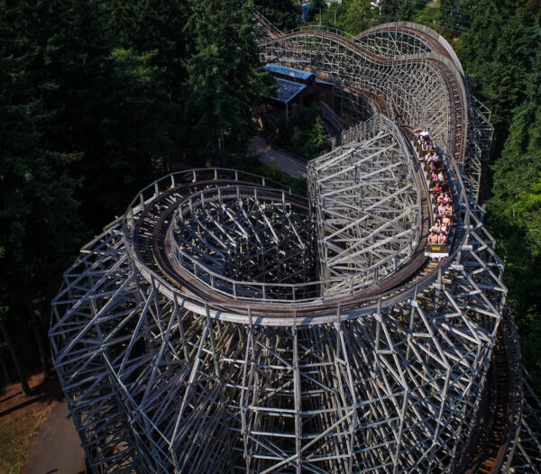 An aerial photo of a very high roller coaster.