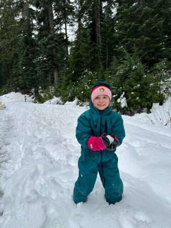 Child playing in snow at Snoqualmie Pass