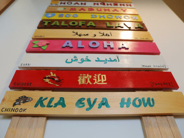 refugees in schools welcome sign