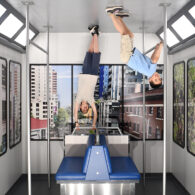 Two kids appearing to hang upside down on the Monorail illusion.