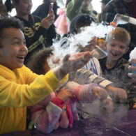 Child playing with Halloween-themed activities at the Museum of Fright in Seattle, a kid-friendly Halloween event.