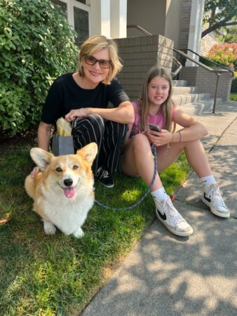 Grandmother Carol Lucas with her granddaughter Ellie Lacy, smiling together