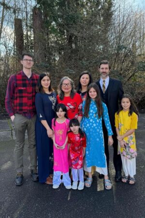 Grandmother Van surrounded by her family in Woodinville