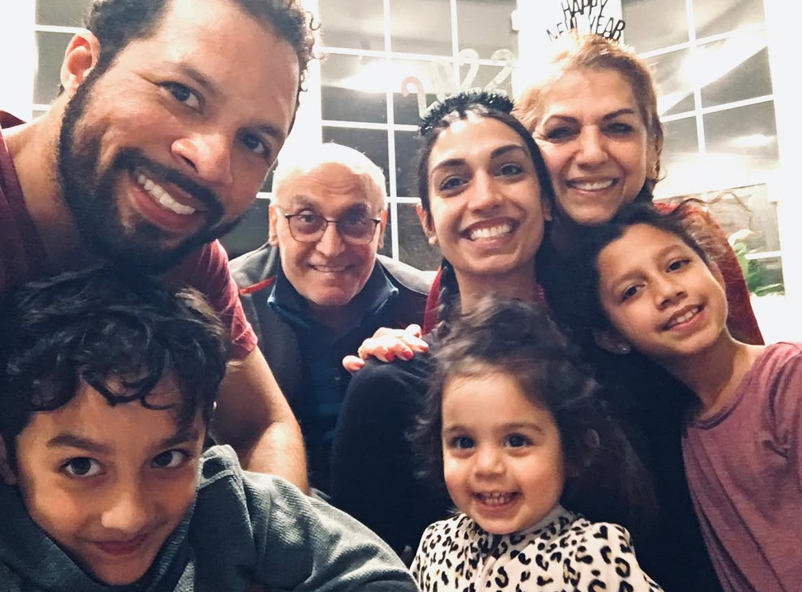 Multigenerational family photo featuring Maryam Zarrabi-Worrell, her children, husband, and her parents