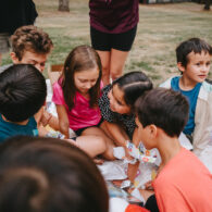 Children playing together at school, smiling and interacting