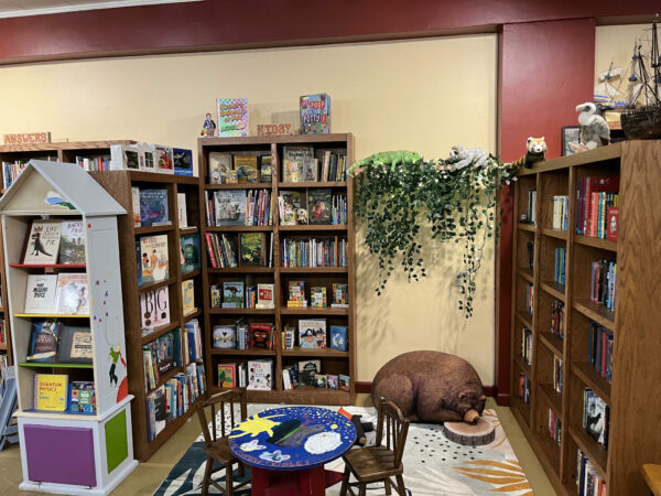 Children’s play area with books and toys at Couth Buzzard Books & Espresso in Seattle