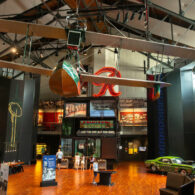 Inside the Museum of History & Industry (MOHAI) in Seattle, with the vintage Boeing seaplane hanging overhead.