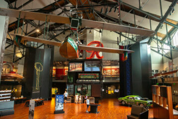 Inside the Museum of History & Industry (MOHAI) in Seattle, with the vintage Boeing seaplane hanging overhead.